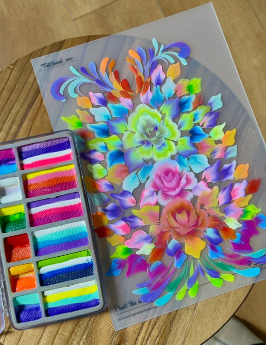 Showing a colourful palette and painted clear practice board 